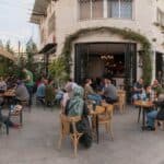 Local residents and visitors at an outdoor café in Amman, Jordan